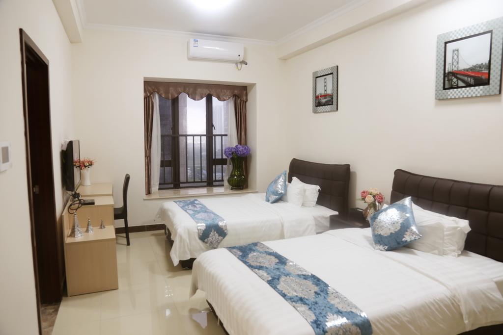 Guangzhou Yi Long International Apartment Rom bilde