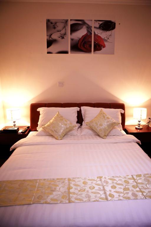 Guangzhou Yi Long International Apartment Rom bilde